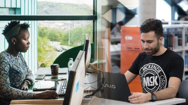 A student at a computer and a graduate at a laptop